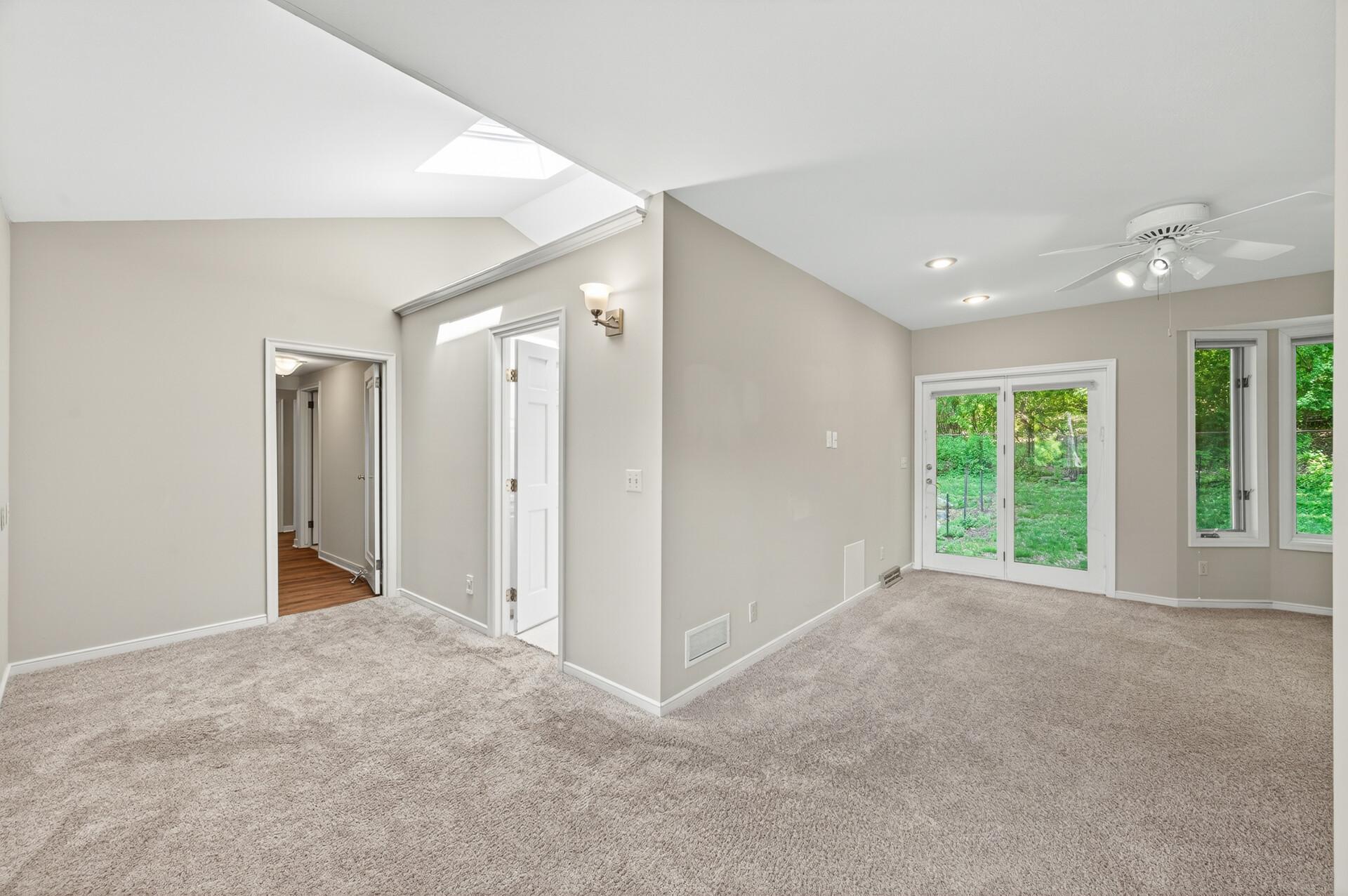 Primary Bedroom showing access to backyard