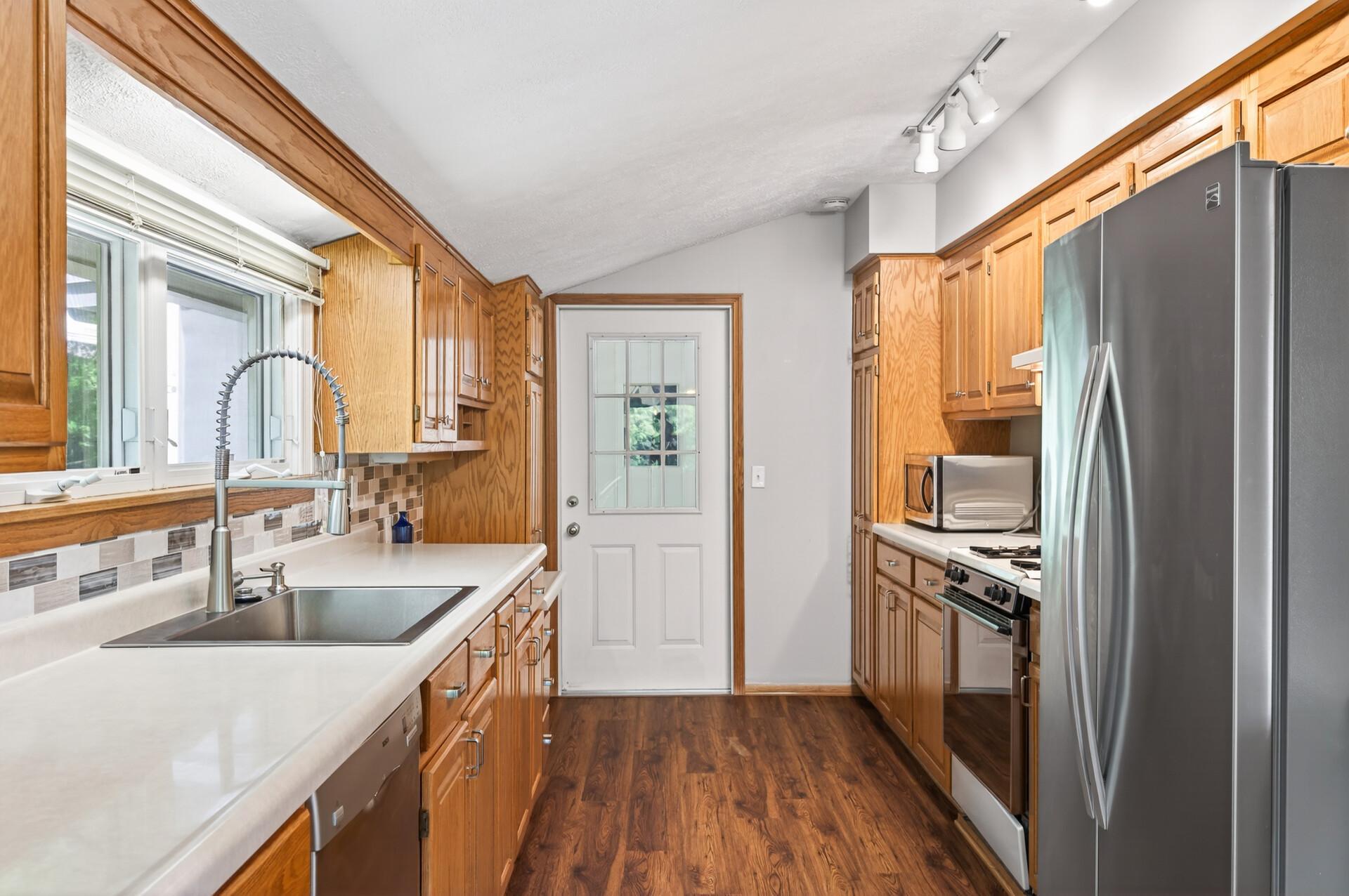 Kitchen-Wonderfully sized with natural light everywhere
