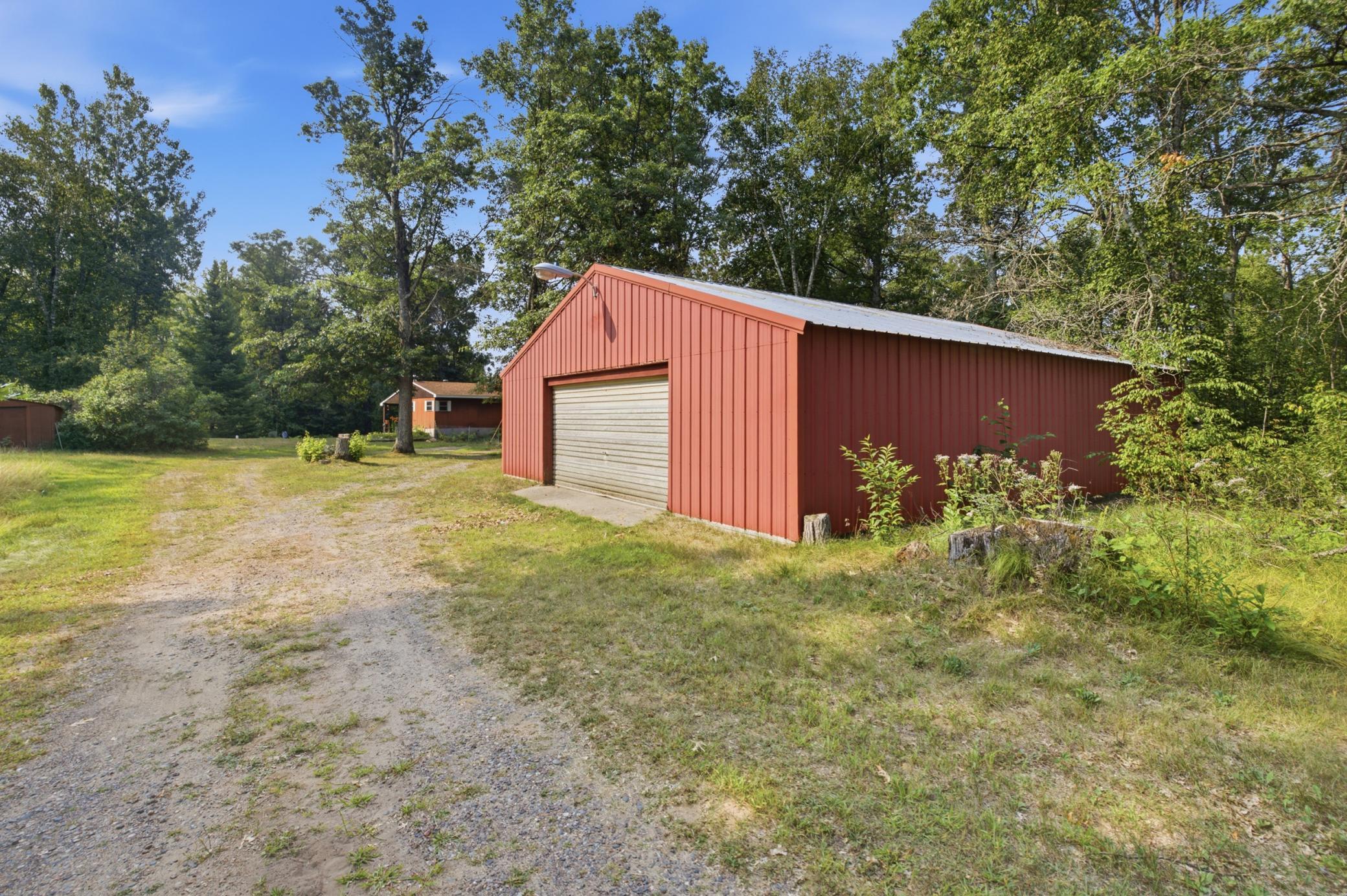 Pole Shed with separate garage and workshop area