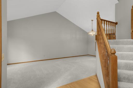Living & dining room with vaulted ceilings