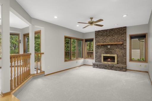 Main floor family room with wood-burning fireplace