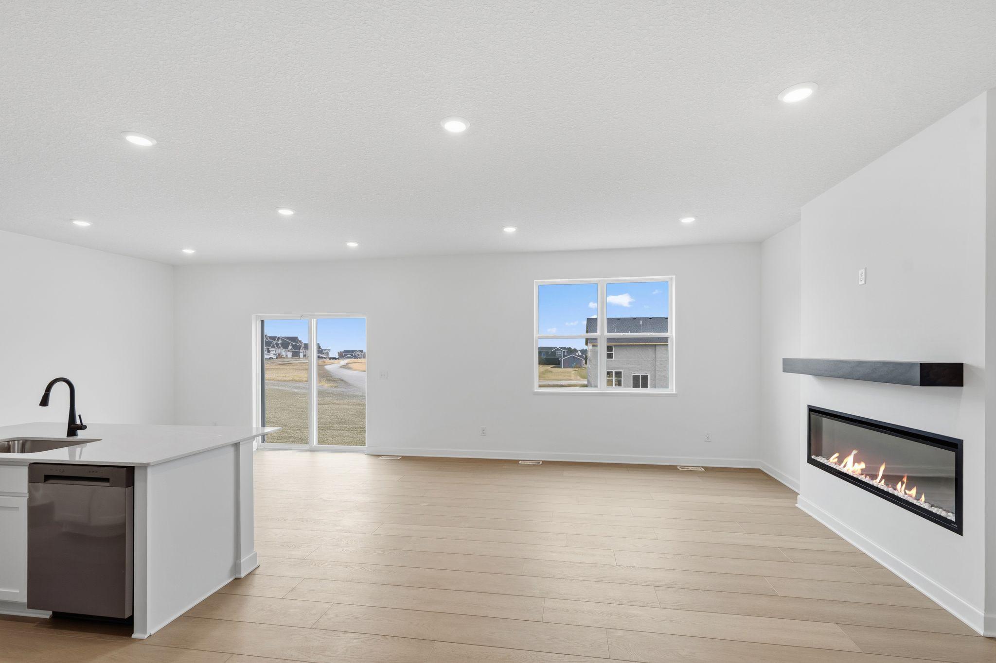 (Photo of a similar home, actual finishes may vary) At the heart of the open concept plan is the Great Room, which provides ample space able to accommodate families of any size.