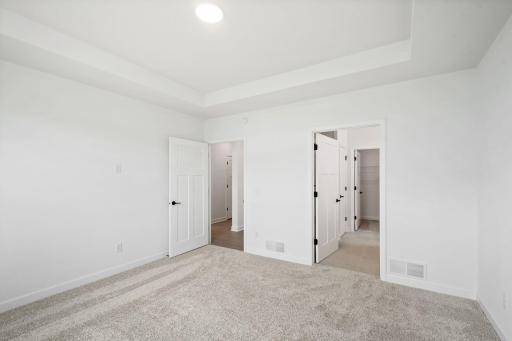 With elegant features like a tray ceiling, the suite creates a lavish haven