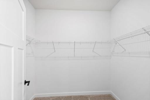 Store wardrobes of any size in the spacious walk-in closet