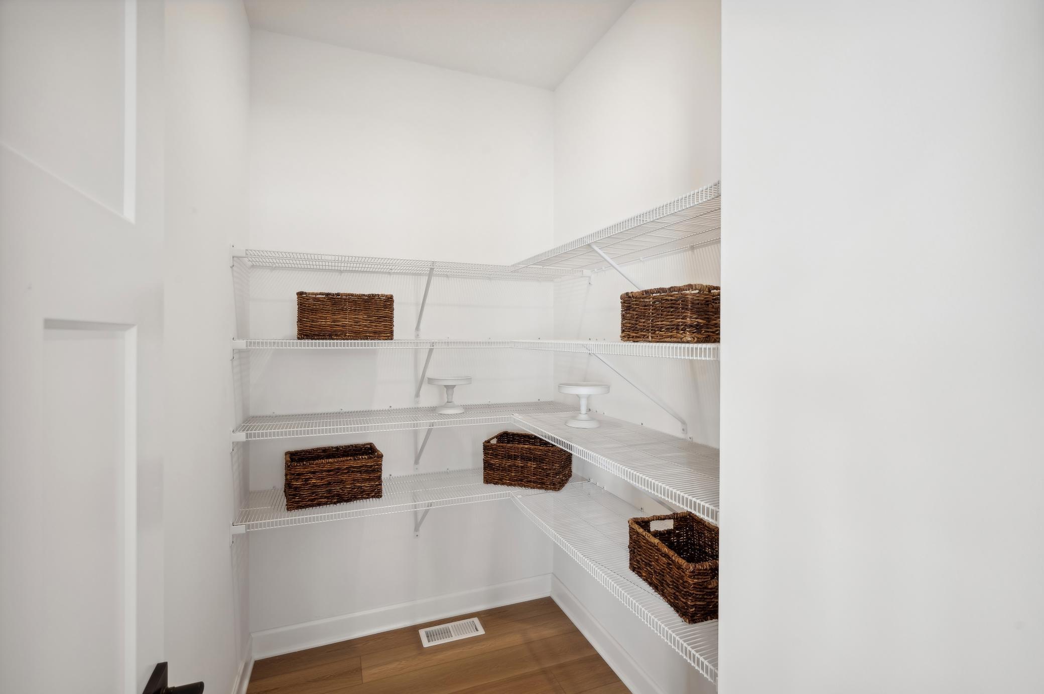 (Photo of model home, finishes will vary) A close up at the huge walk in pantry!