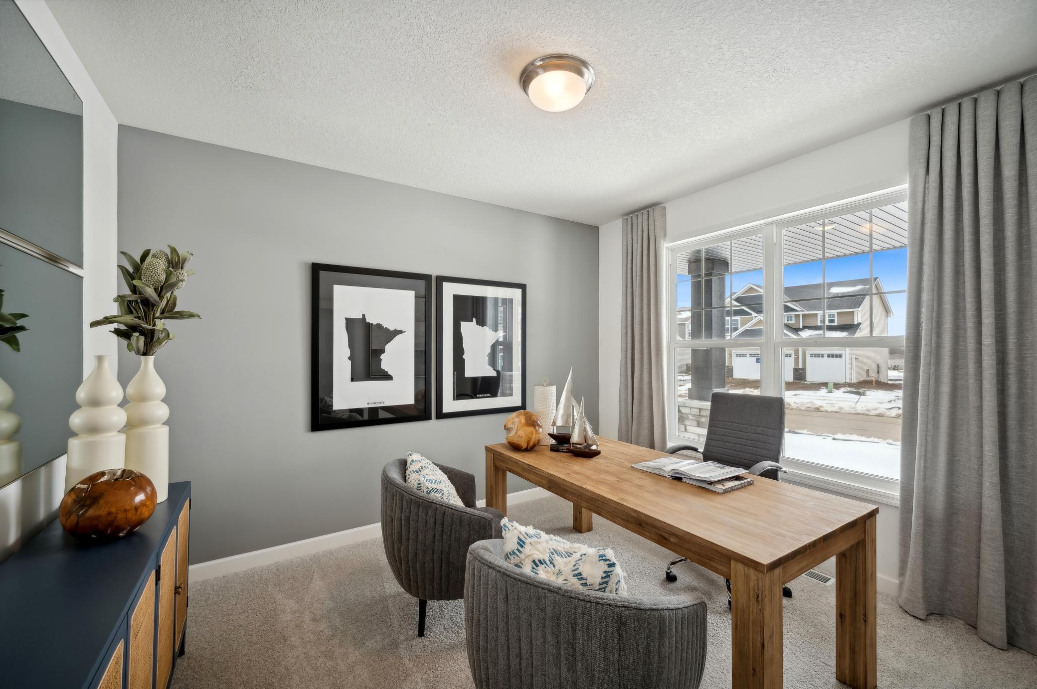 (Photo of model home, finishes will vary) This main level study provides a perfect setting for those working from home, paying bills or completing a school project.