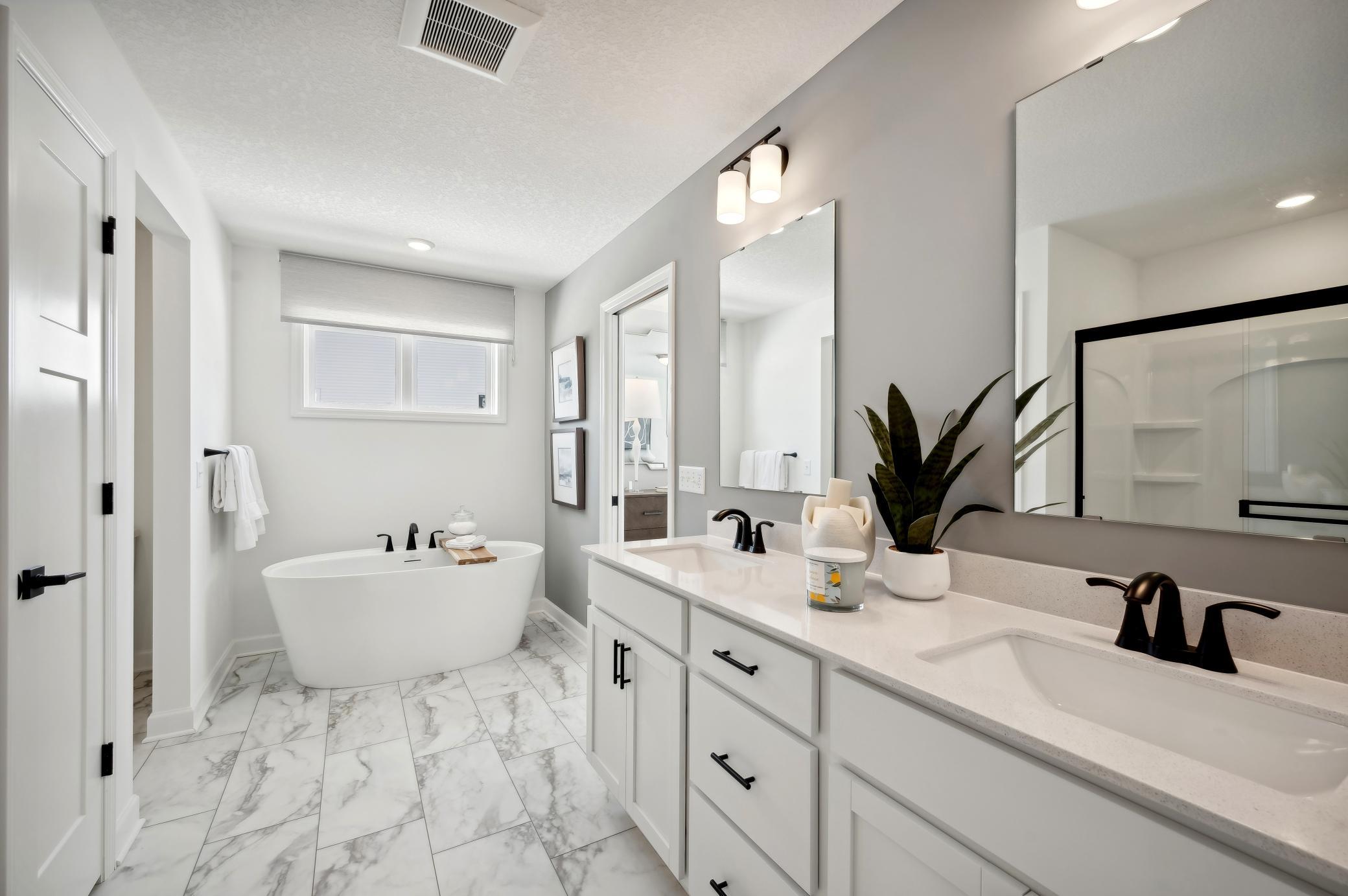 (Photo of model home, finishes will vary) Another view of the incredible owner's suite bath.