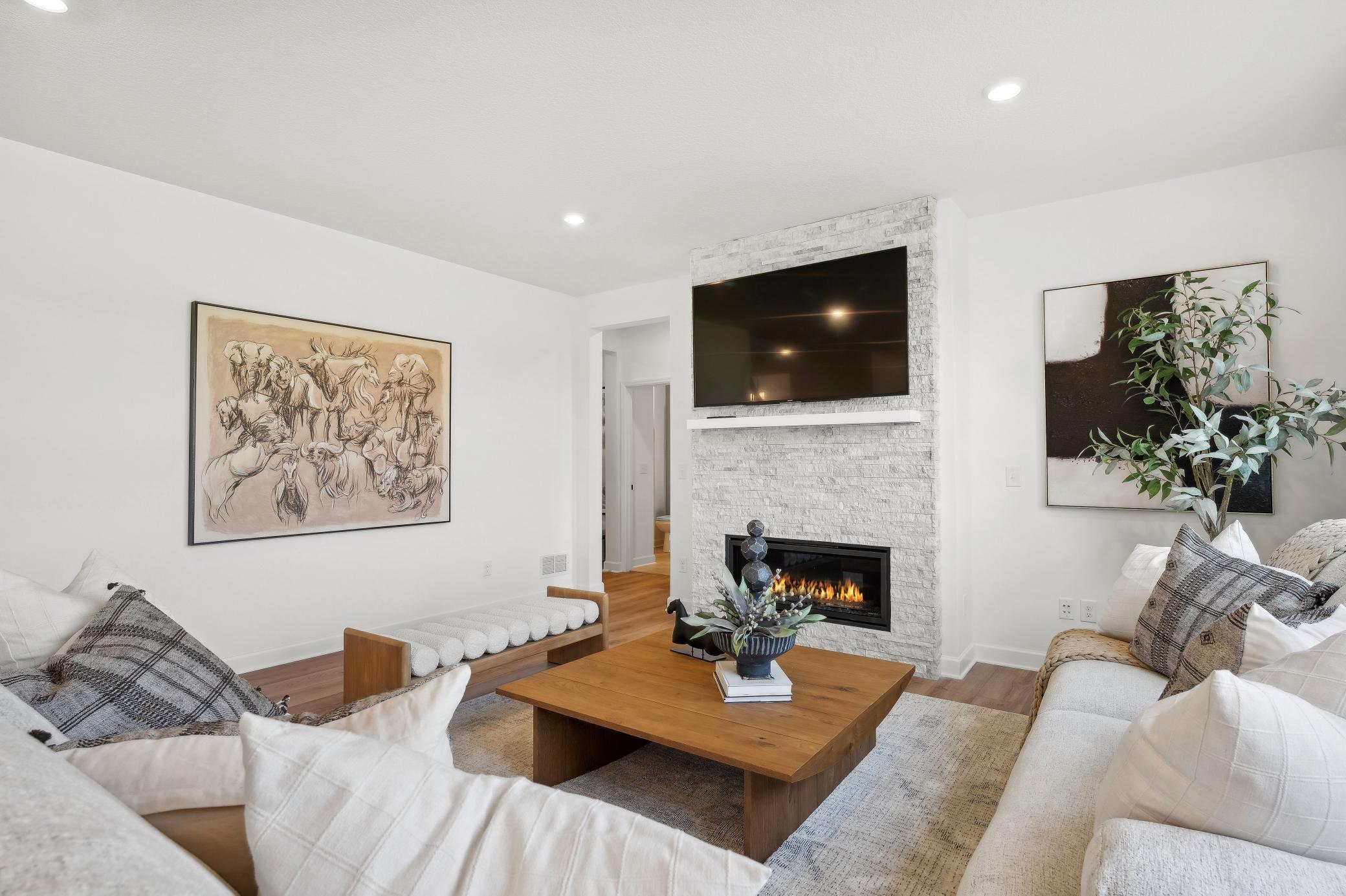 (Photo of model home, finishes will vary) Enjoy shared moments with loved ones in the comfortable and spacious Great Room, where expansive windows flood the space with natural light.