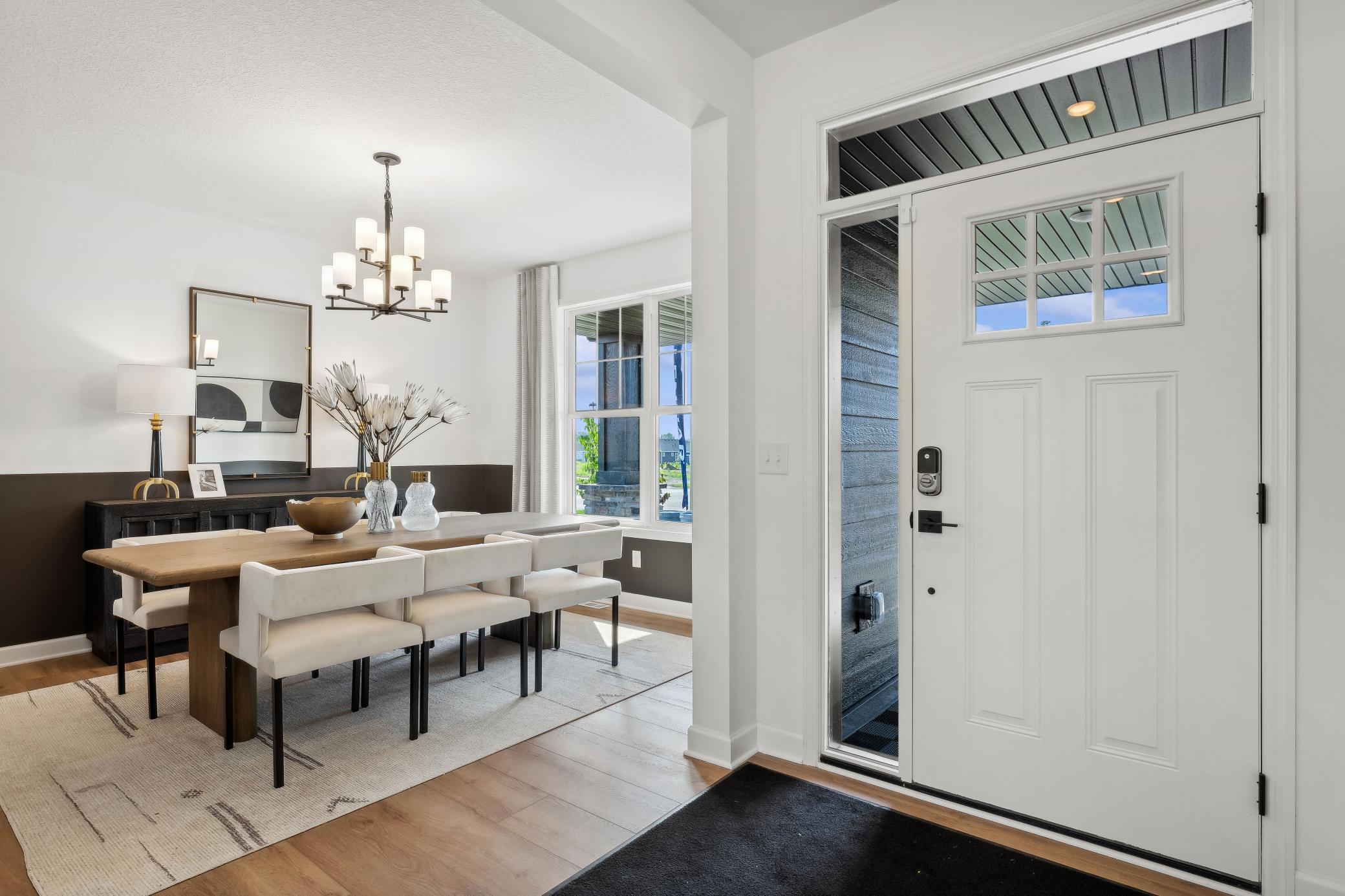 (Photo of model home, finishes will vary) A formal dining room is easily accessed through the kitchen, ideal for dinners with extended family and holiday celebrations with guests.