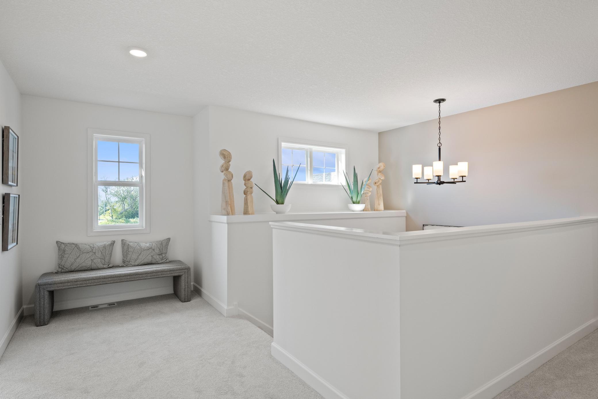 (Photo of model home, finishes will vary) Upper landing.