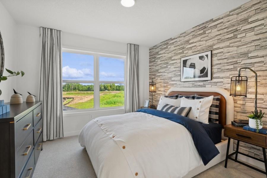 (Photo of model home, finishes will vary) Three secondary bedrooms are located on the second floor.