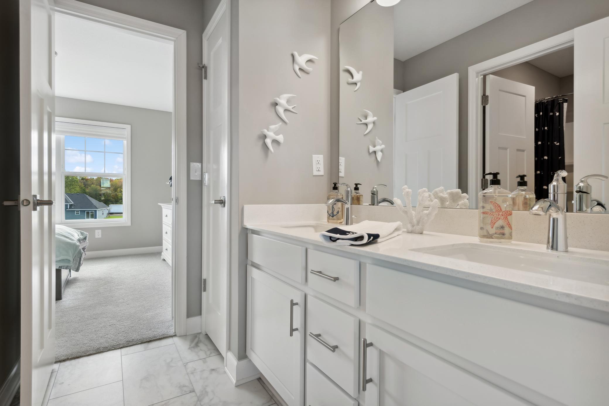 (Photo of model home, finishes will vary) Jack and jill bath!