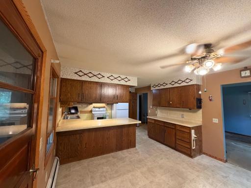 Kitchen/Dining with several cabinets
