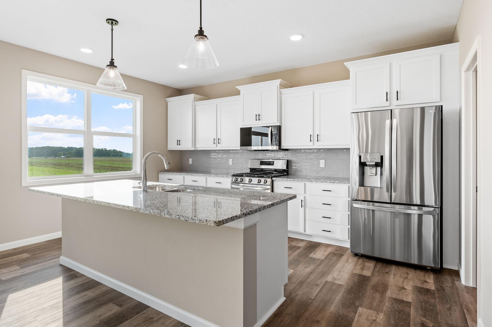 Photos are of a like home in different location. Options may be different in actual home