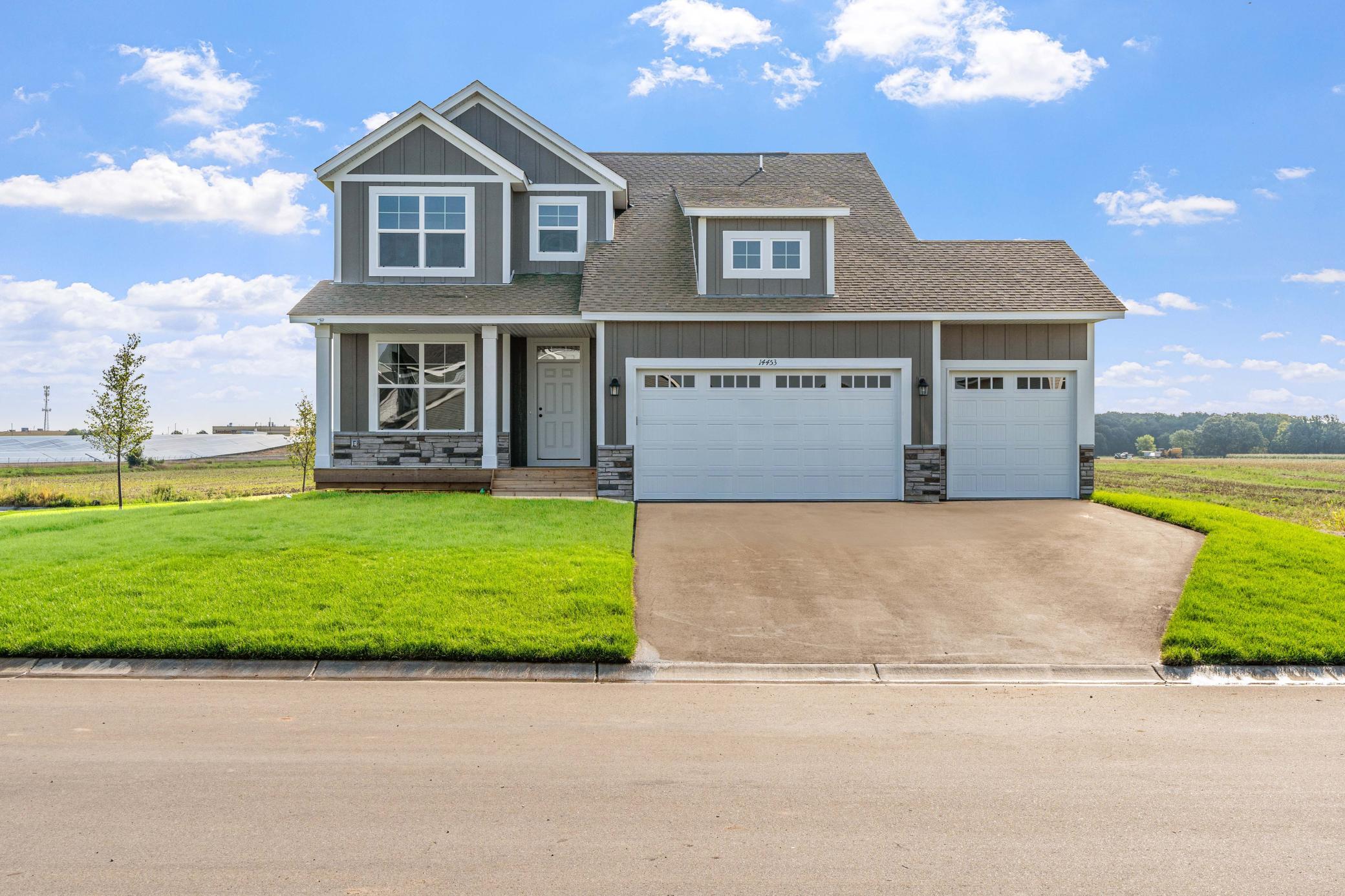 Photos are of a like home in different location. Options may be different in actual home Actual home has garage on the left side.
