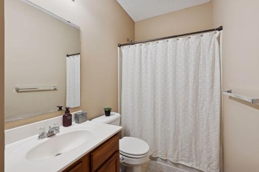 Full basement bath also has a nice linen storage to the left of the sink