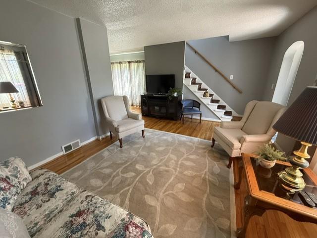 Living room w/staircase