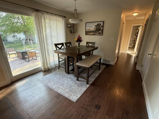 Dining area - beautiful flooring & patio door