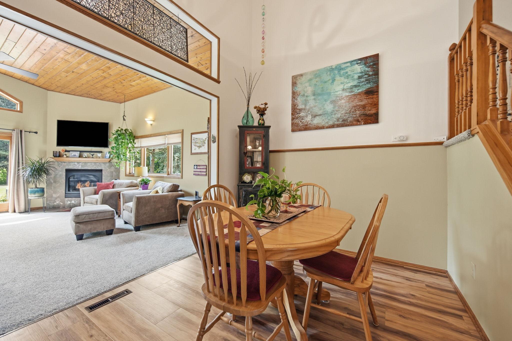 Convenient dining room off the kitchen flows into the main floor living room.