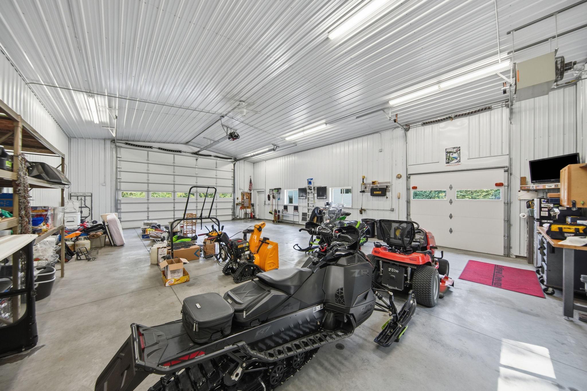 Two garage door for easy access! This would also make a great shop for a home business!