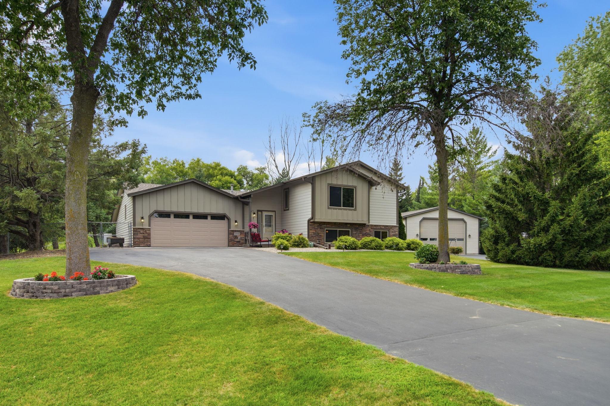 Over 1 picture perfect acre in Otsego!