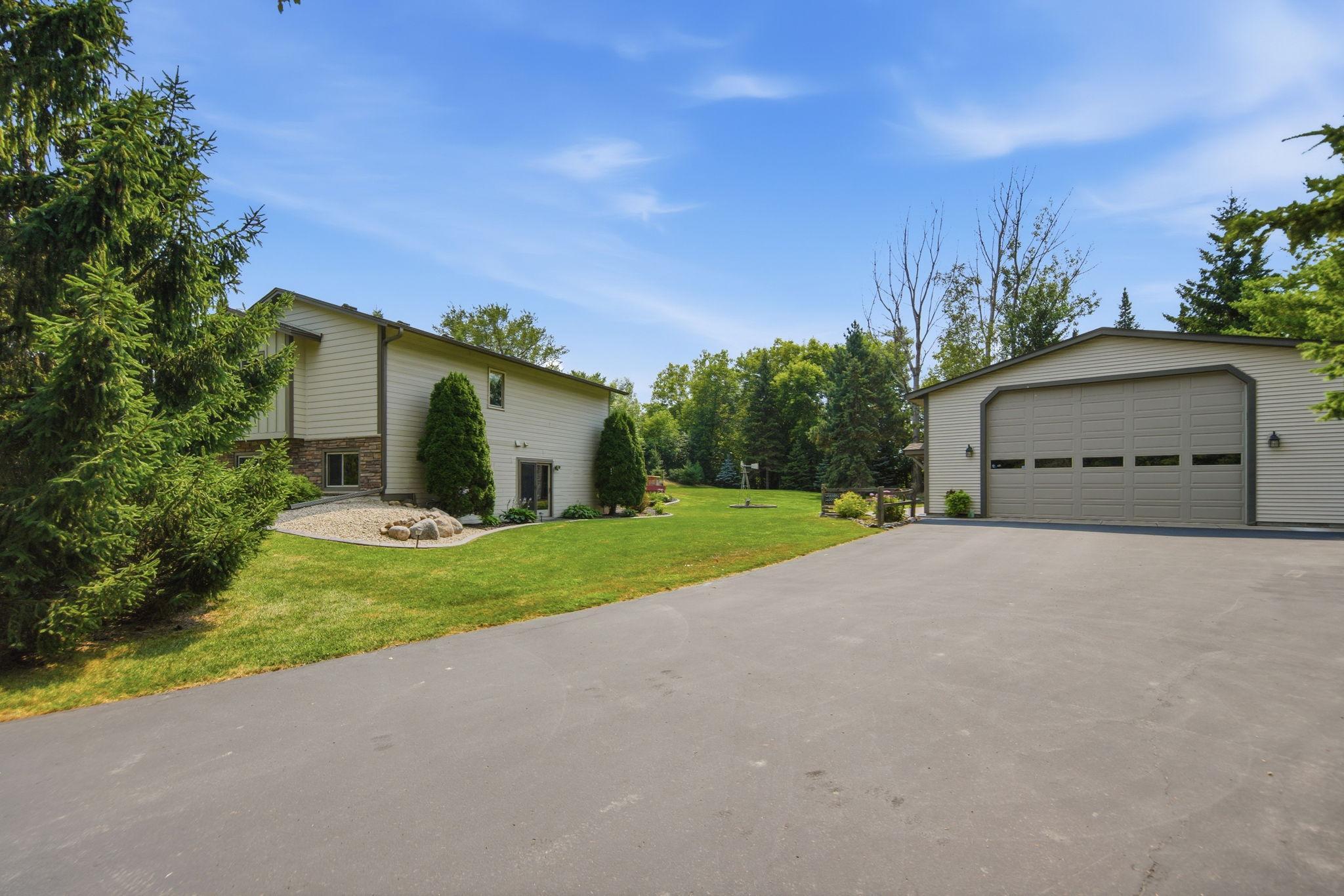 46’ x 32’, 1500 square foot detached garage with 13’6” garage door!