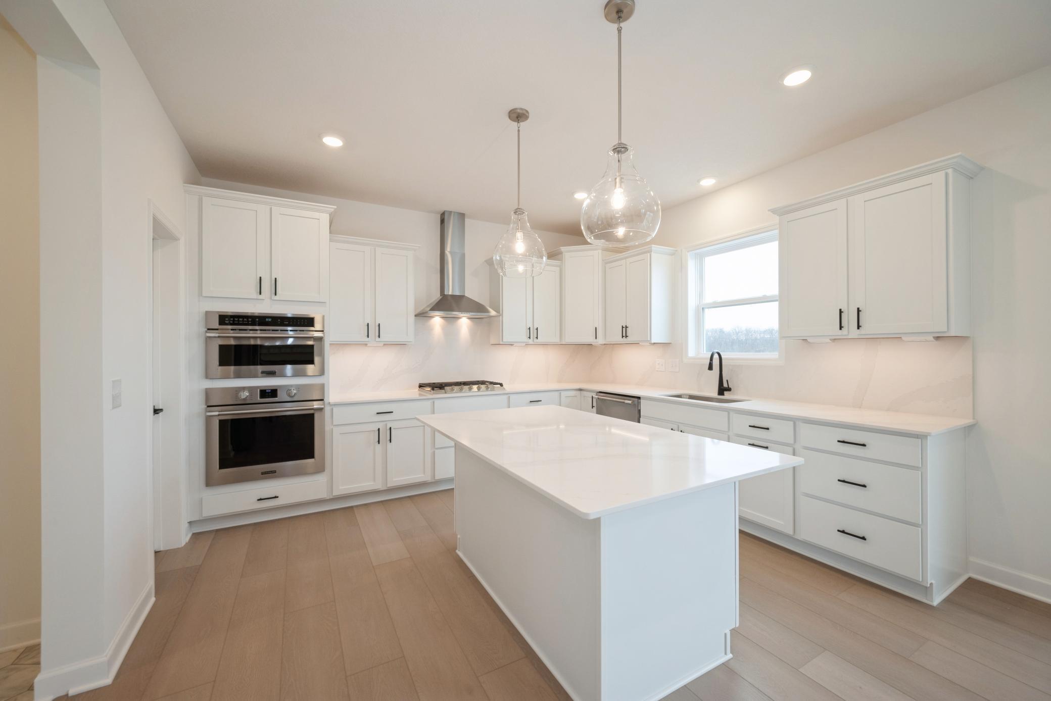 (All the following photos are of a similar home, actual finishes may vary.)