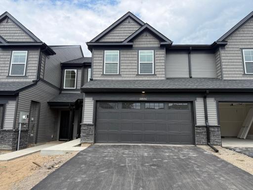 Welcome to 10551 Harbor Ln N! (Photo is of the actual home.)