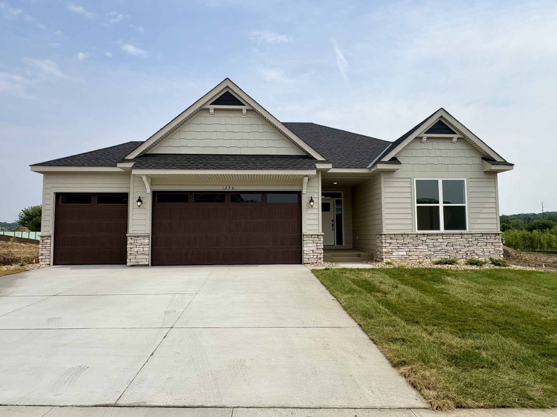 Welcome to 1256 Hadley Hills Dr NE! (Photo is of the actual home.)