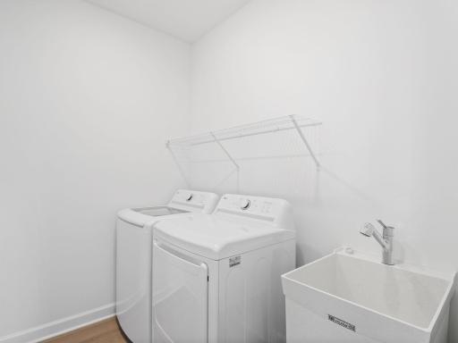 Located across the hall from the owner’s suite, the laundry room provides a location in the home to do weekly chores and keep the mess out of sight.
