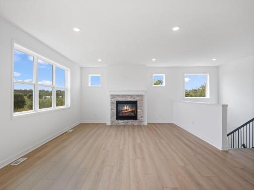 A natural gathering place, the Great Room is a space for spur-of-the moment get-togethers and celebrations that flows seamlessly into the adjacent dining room and kitchen.