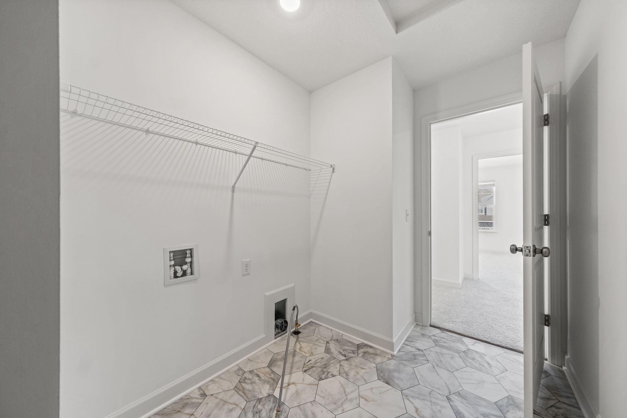 (Photo of a similar home, actual homes finishes will vary)