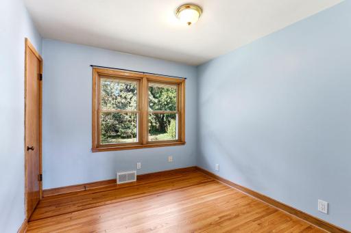 2nd BR with large window, overlooks back yard