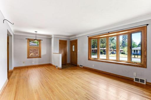 Gleaming hardwood floors, all windows double-pane