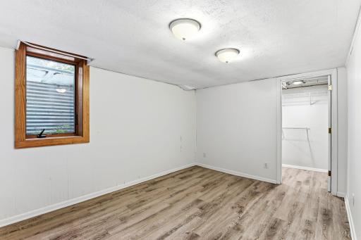 Egress window in 4th BR in LL, plank flooring