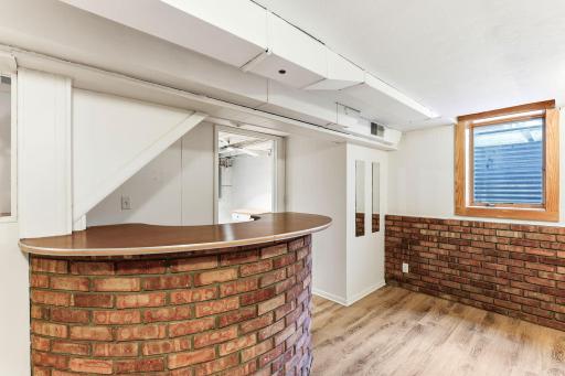 Bar area with shelving behind bar