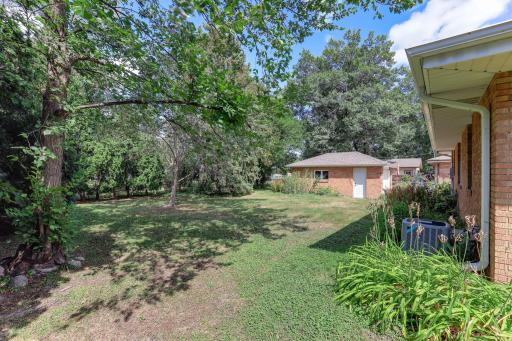 Mature lot, vacated alley behind lot!