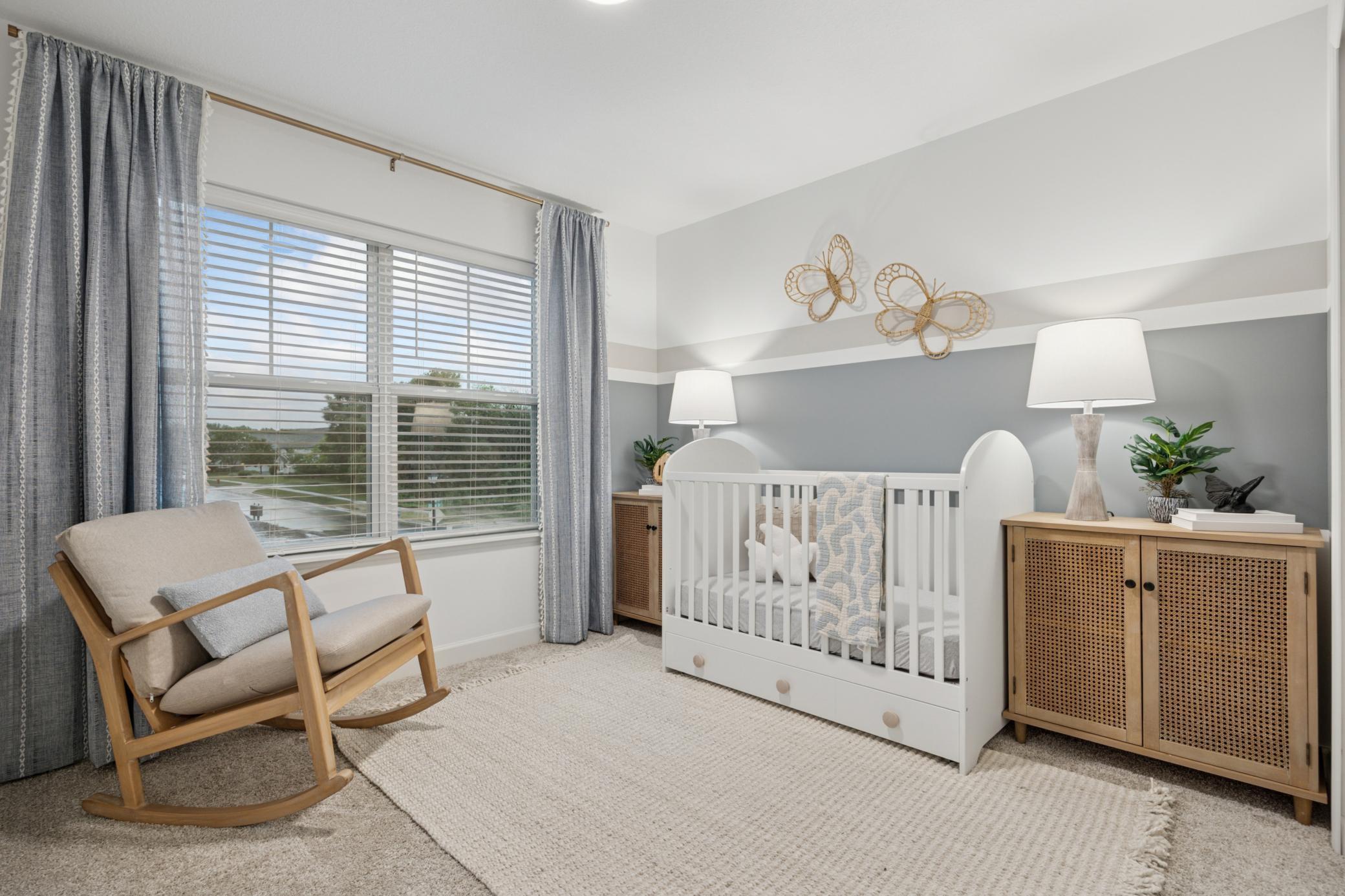 (Photo is of a model home, finishes will vary) Either of the two secondary bedrooms can act as a quiet nursery for new family members, as it’s furnished here.