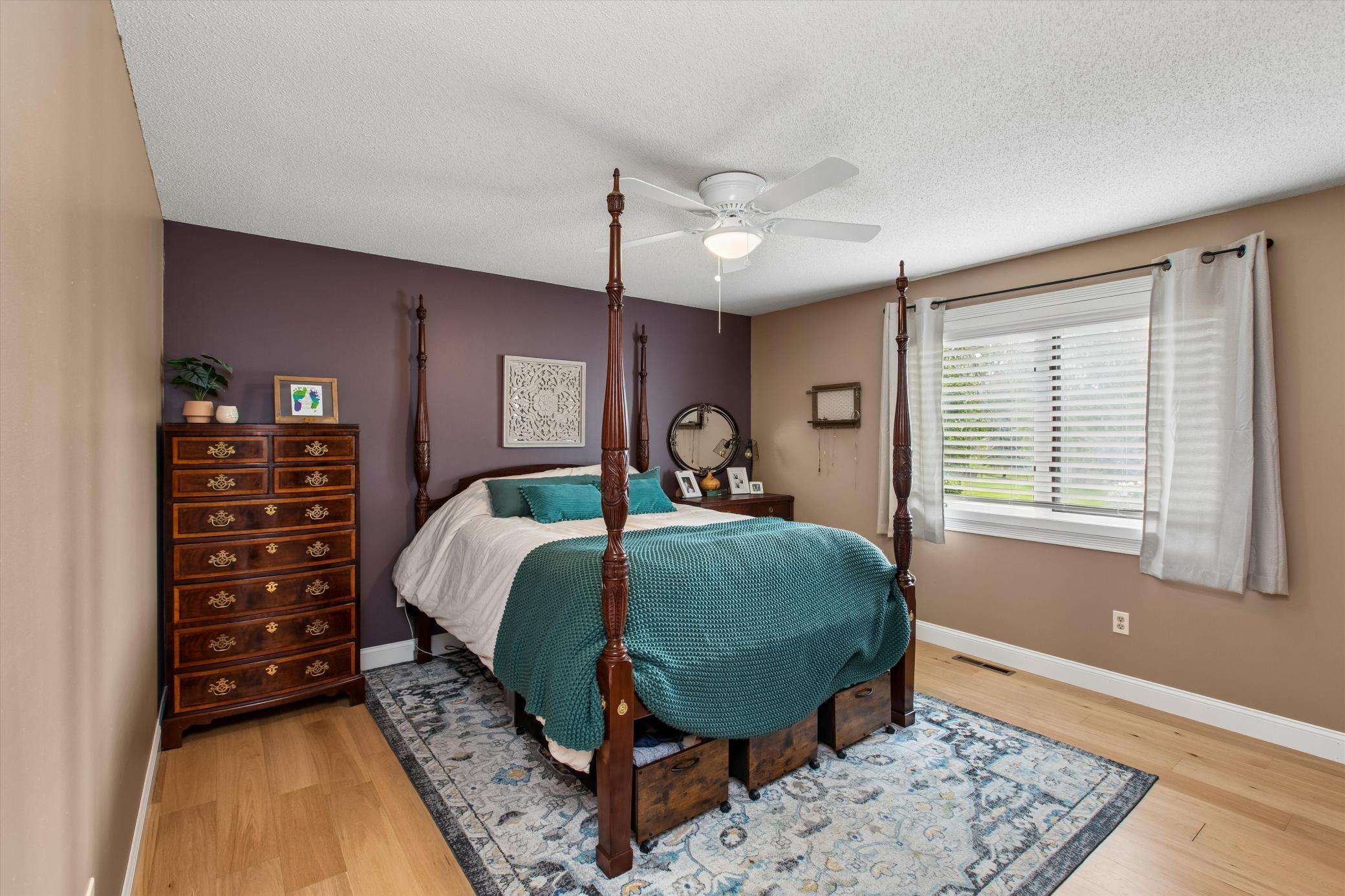 Primary bedroom has large closet and bright natural light