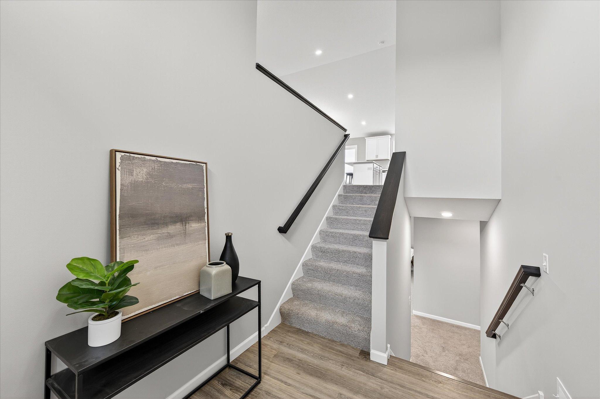 A welcoming entry sets the stage for a home that's bright, functional, and designed for everyday living. *photos of a previously staged home, not all options & finishes may be exact.*
