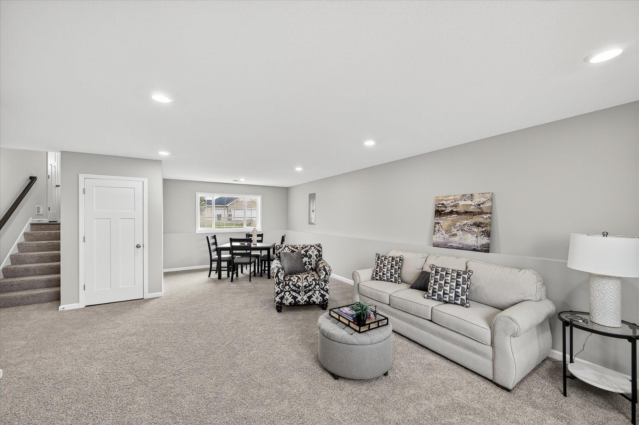 Create the sectional-and-big-screen setup you've been dreaming about without sacrificing your main living room upstairs. *photos of a previously staged home, not all options & finishes may be exact.*