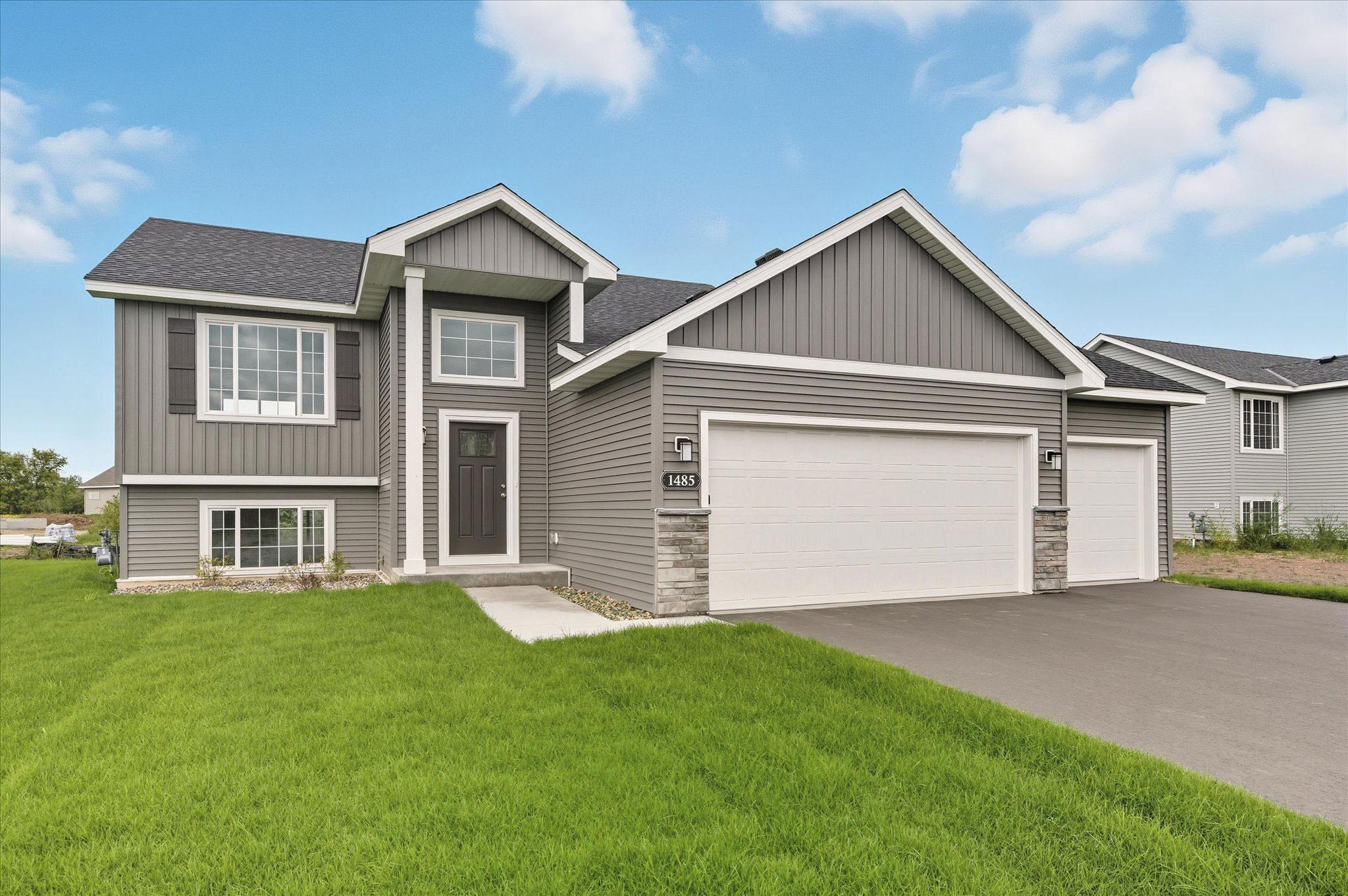 Modern new construction, a three-car garage, and a thoughtfully designed floor plan ready for its first owners. *photos of a previously completed home, not all options & finishes may be exact.*