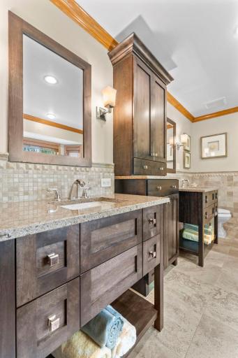 Separate double vanities with storage