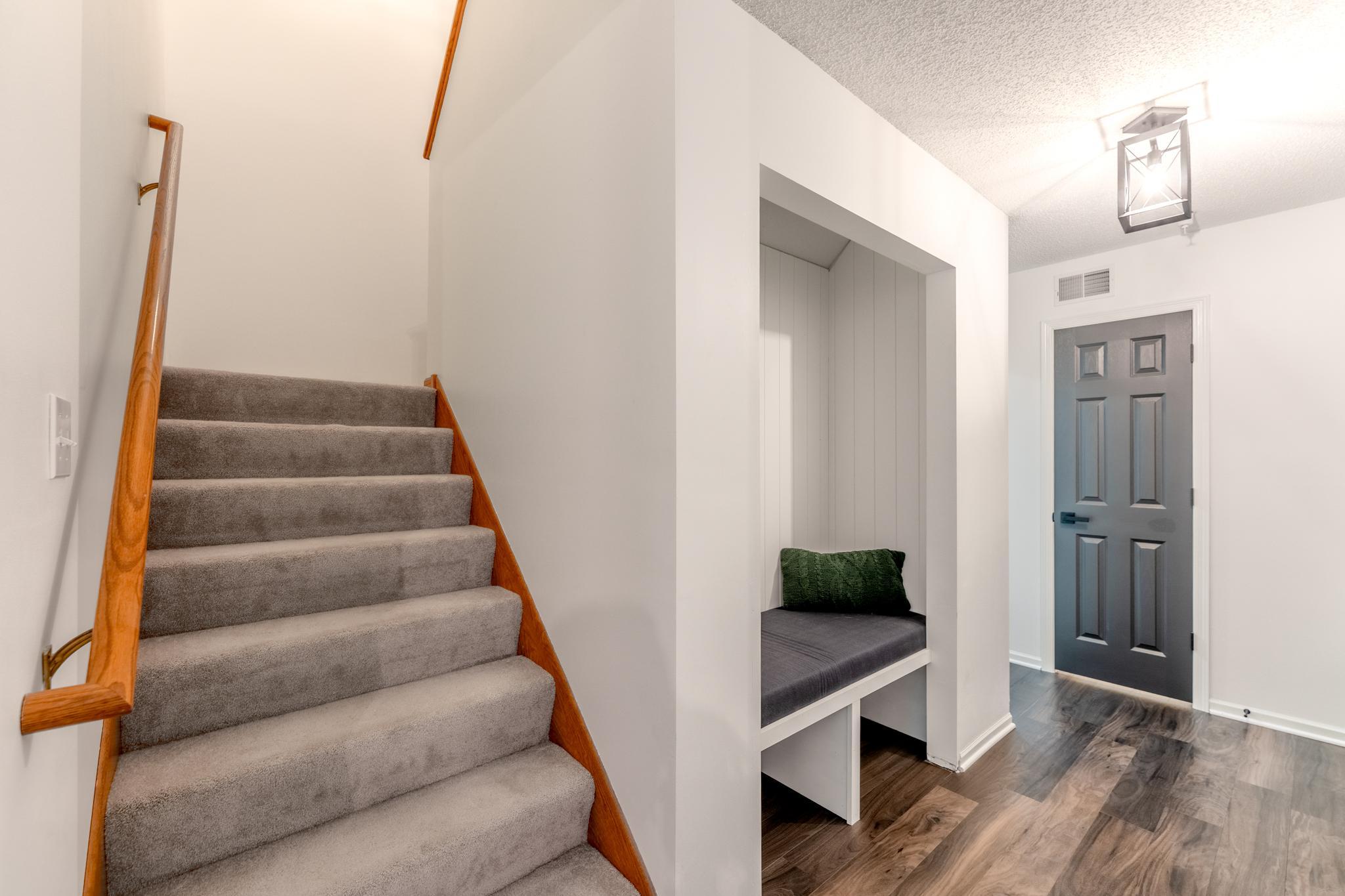 Door at end of hall is half bath.
