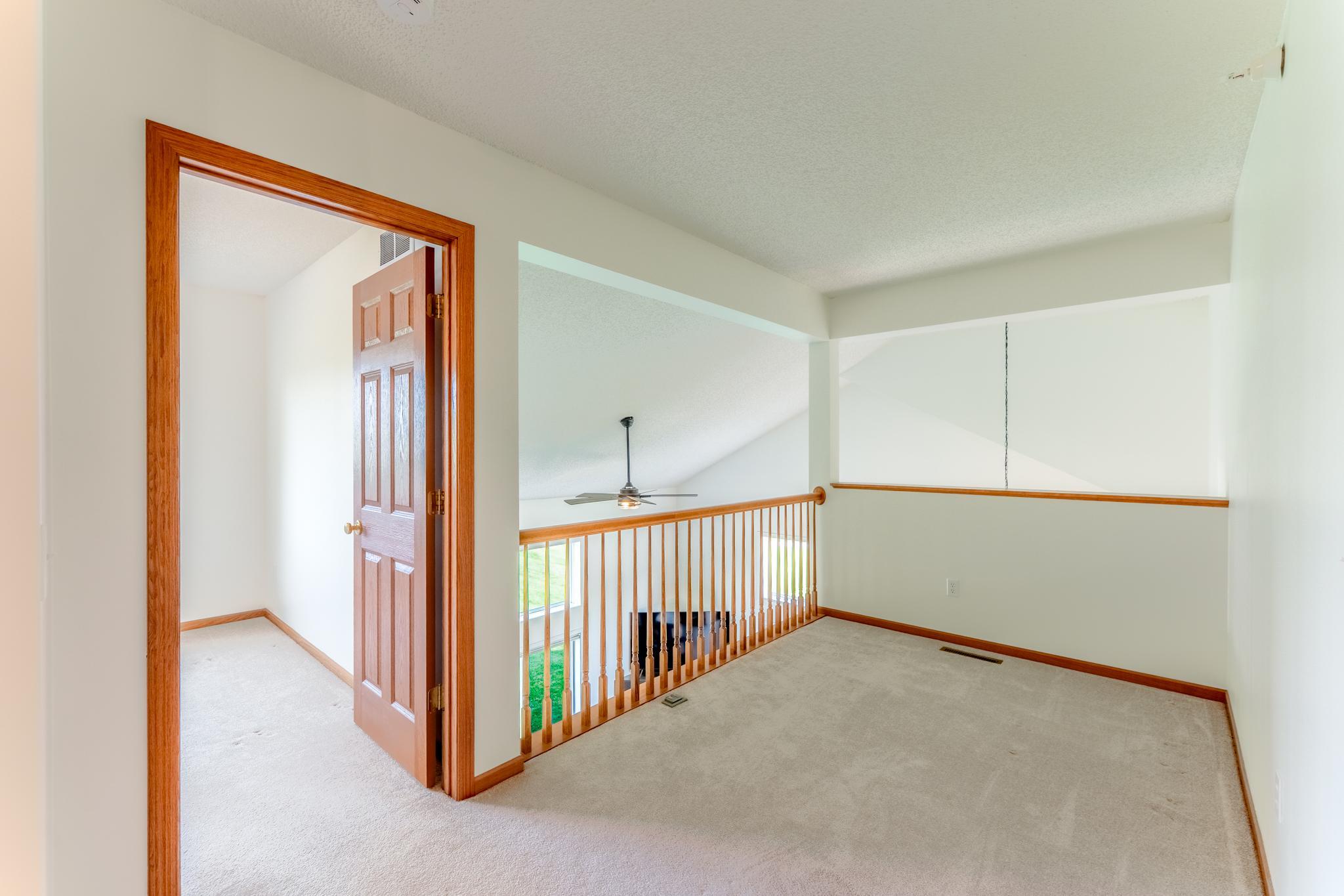 The loft is perfect for a small office space or reading nook.