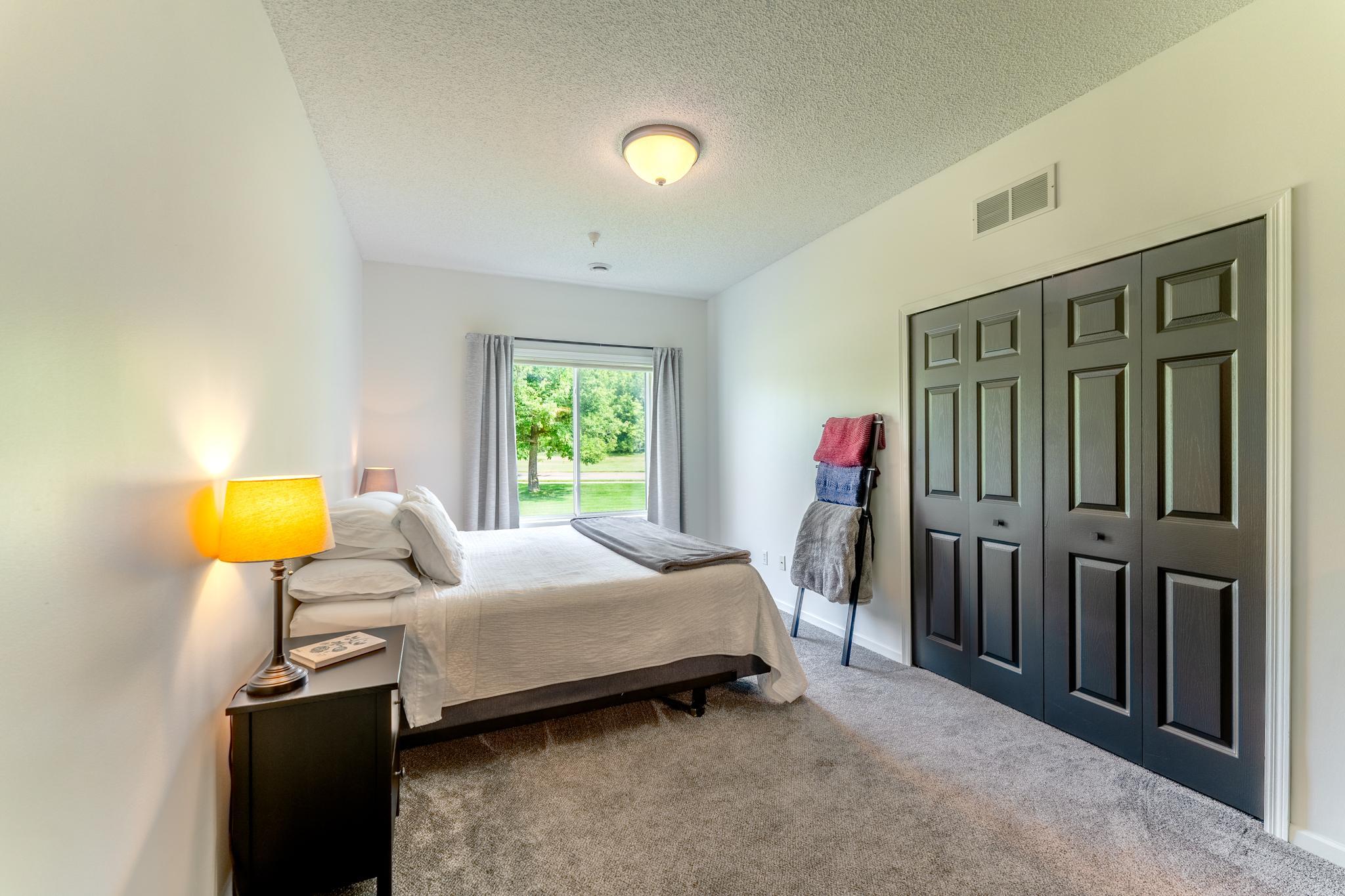 Main floor bedroom has room for king size bed.