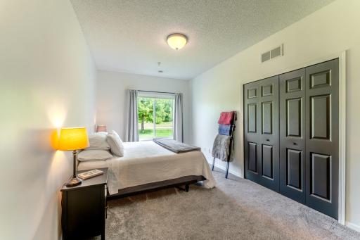 Main floor bedroom has room for king size bed.