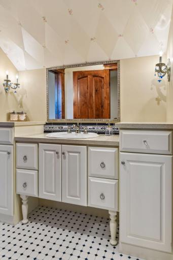 The ¾ bathroom connected to the fourth upper-level bedroom also offers hallway access, creating a flexible and convenient layout.