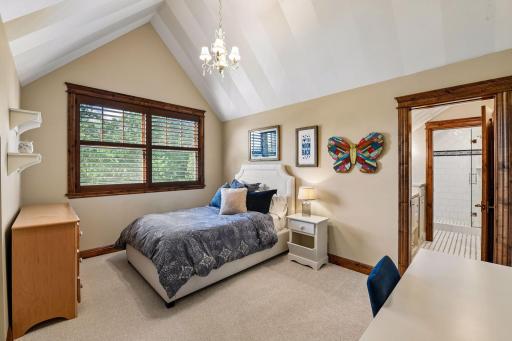 Upper-level fourth bedroom with its own ¾ bath.