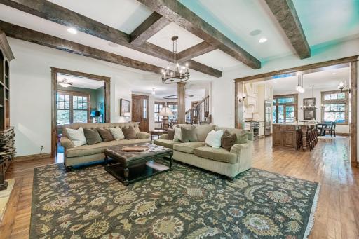 The living room flows seamlessly into the large eat-in kitchen, creating an open and connected main-level layout.